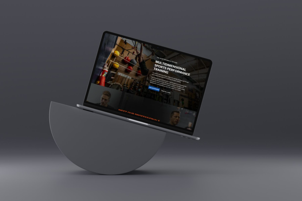 In The Core homepage on screen, a website designed by Telos Creative